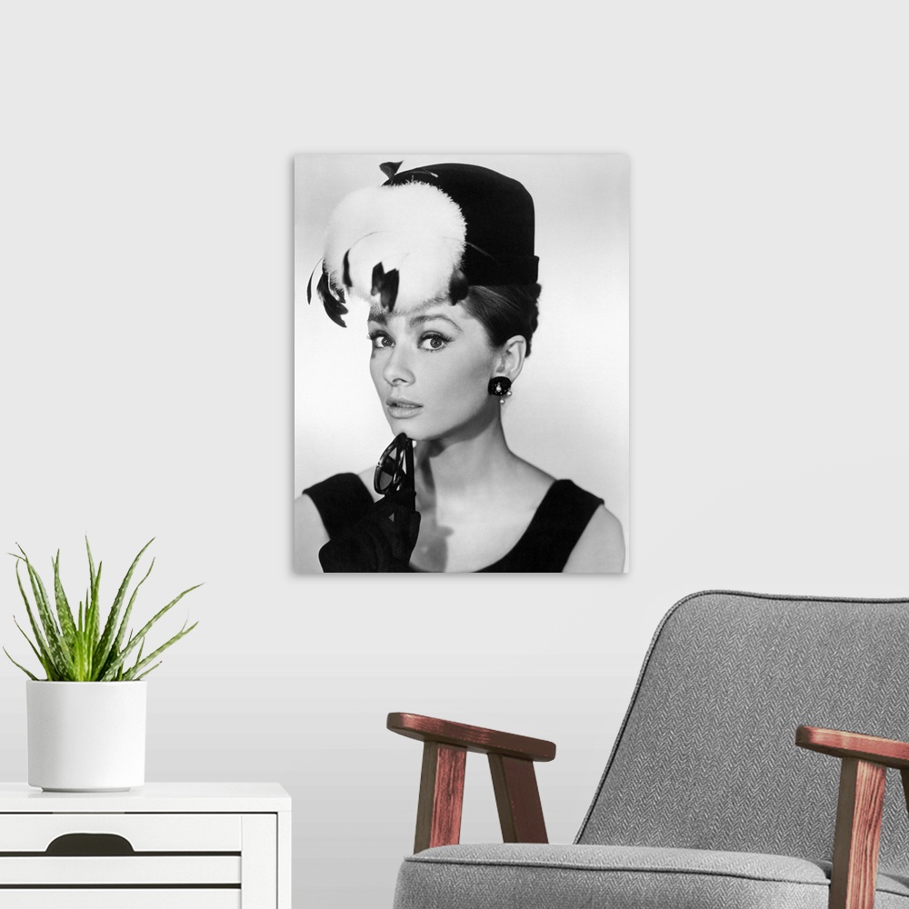A modern room featuring This decorative wall art is a portrait photograph of the Hollywood actress in character as the se...