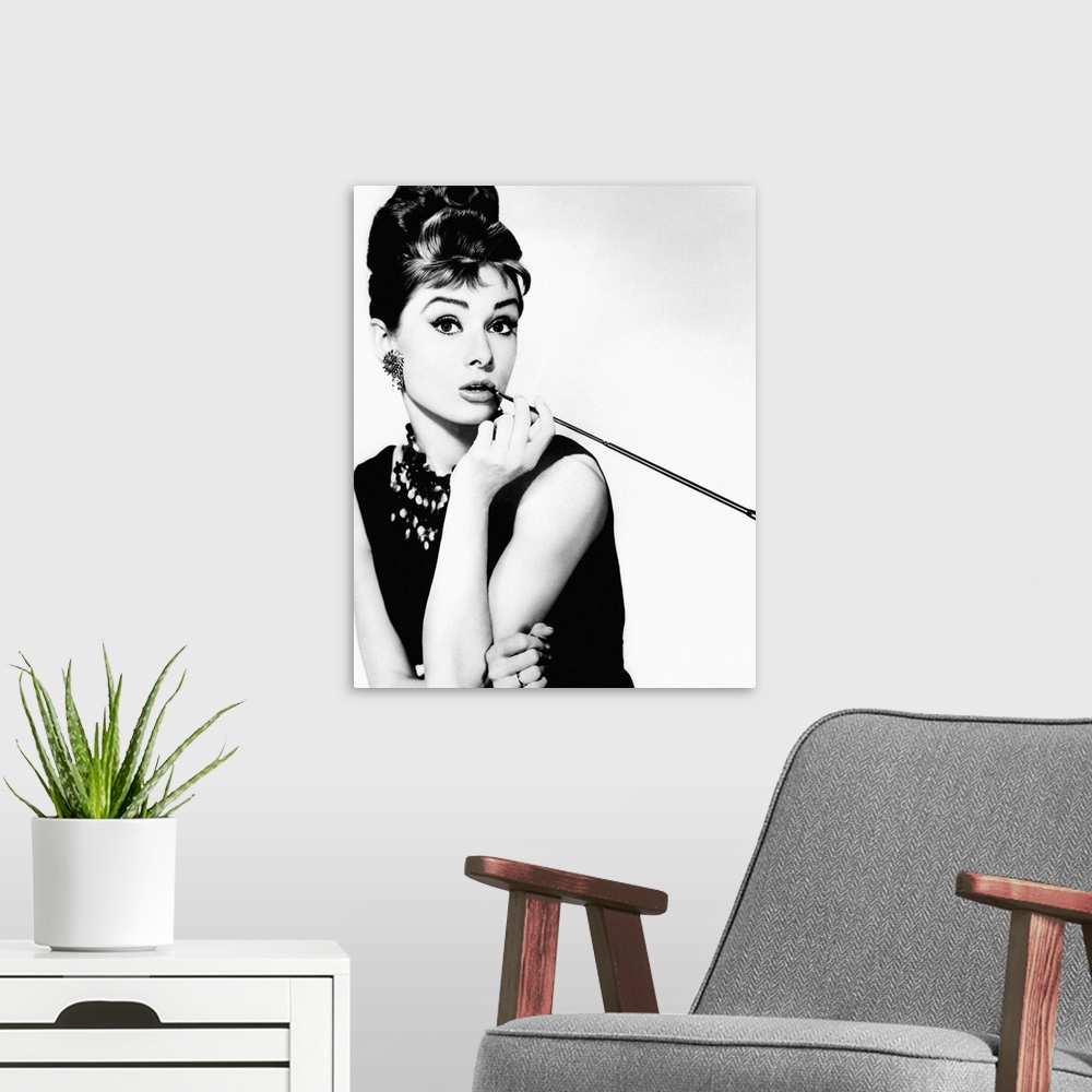 A modern room featuring Black and white photograph of Audrey Hepburn from Breakfast at Tiffany's.