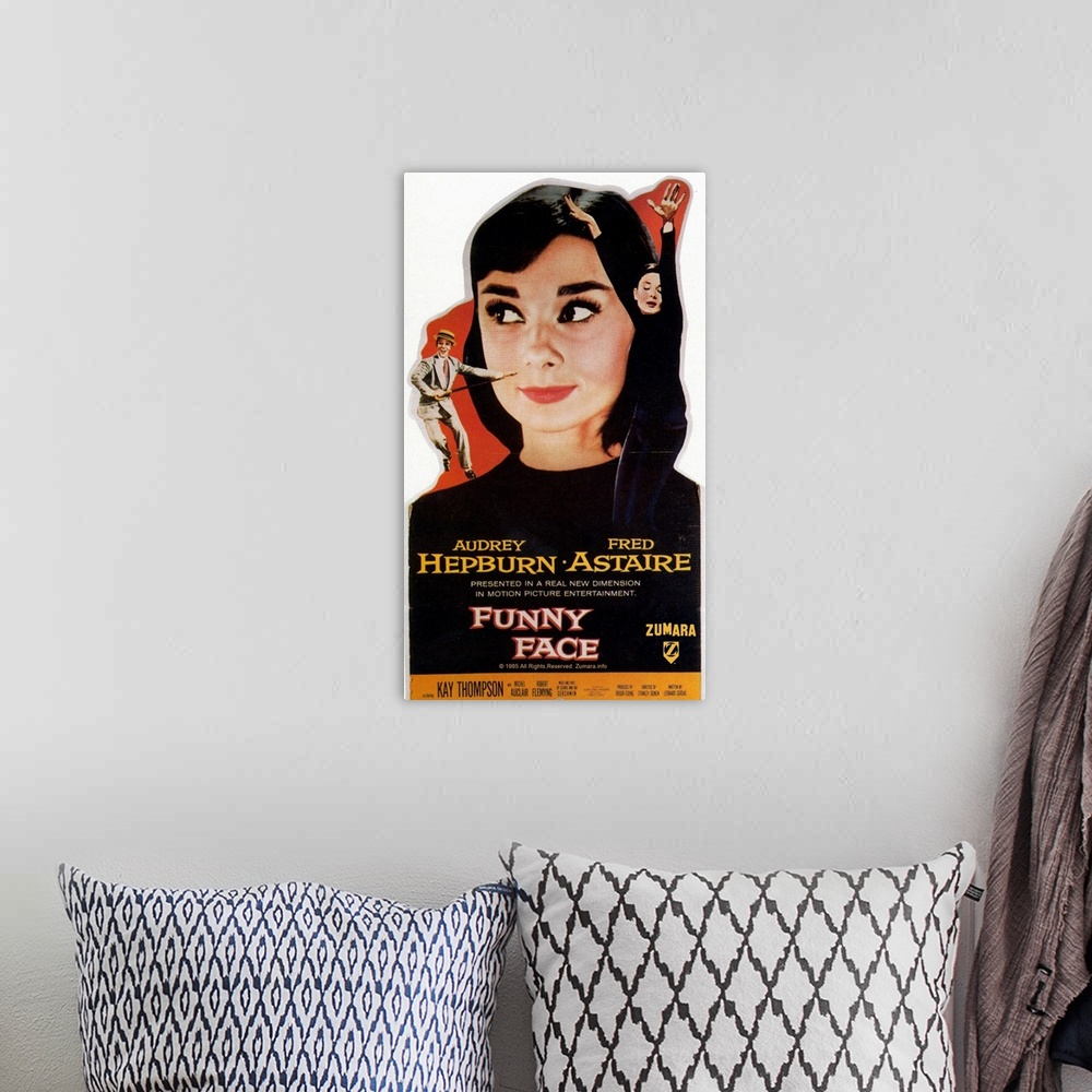 A bohemian room featuring Audrey Hepburn Funny Face Big Head Poster