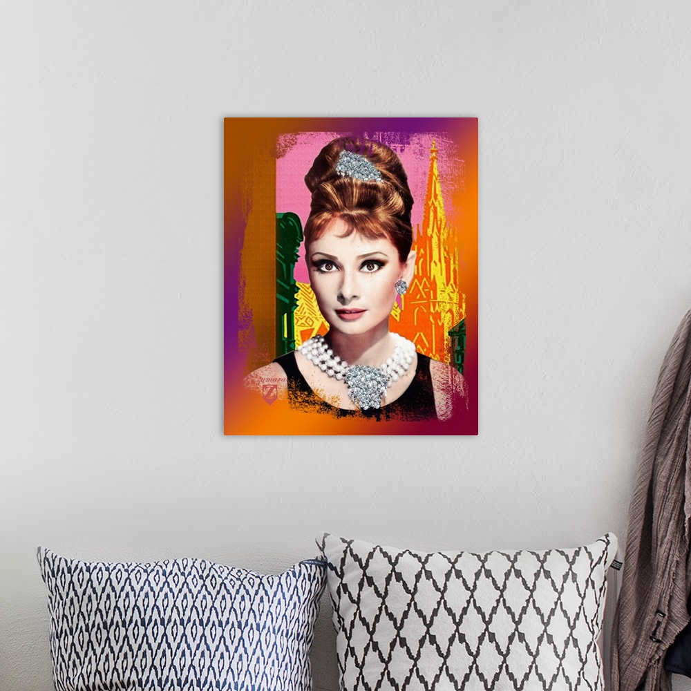 A bohemian room featuring Portrait artwork on a large wall hanging of a bust image of Audrey Hepburn wearing a large, jewel...