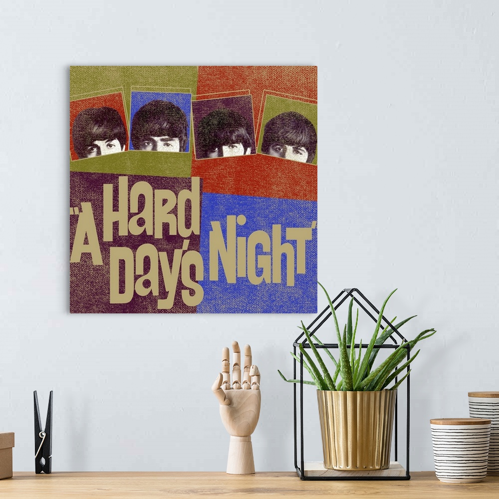 A bohemian room featuring Square "A Hard Day's Night" poster.