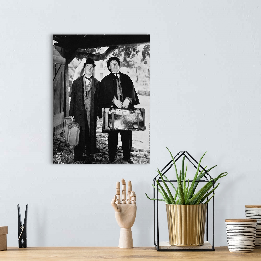 A bohemian room featuring Laurel and Hardy B&W Bonnie Scotland 1