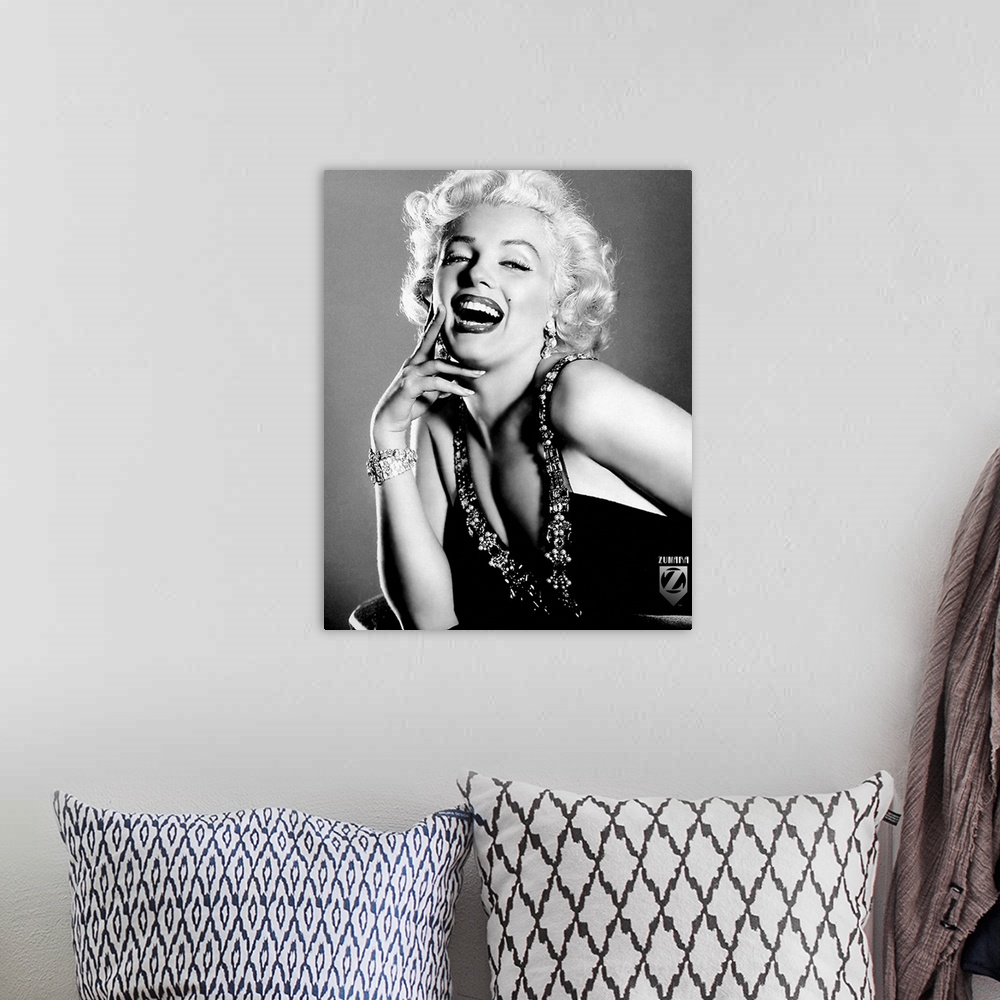 A bohemian room featuring Portrait photograph of American actress, model, singer, and sex symbol Norma Jeane Mortenson.