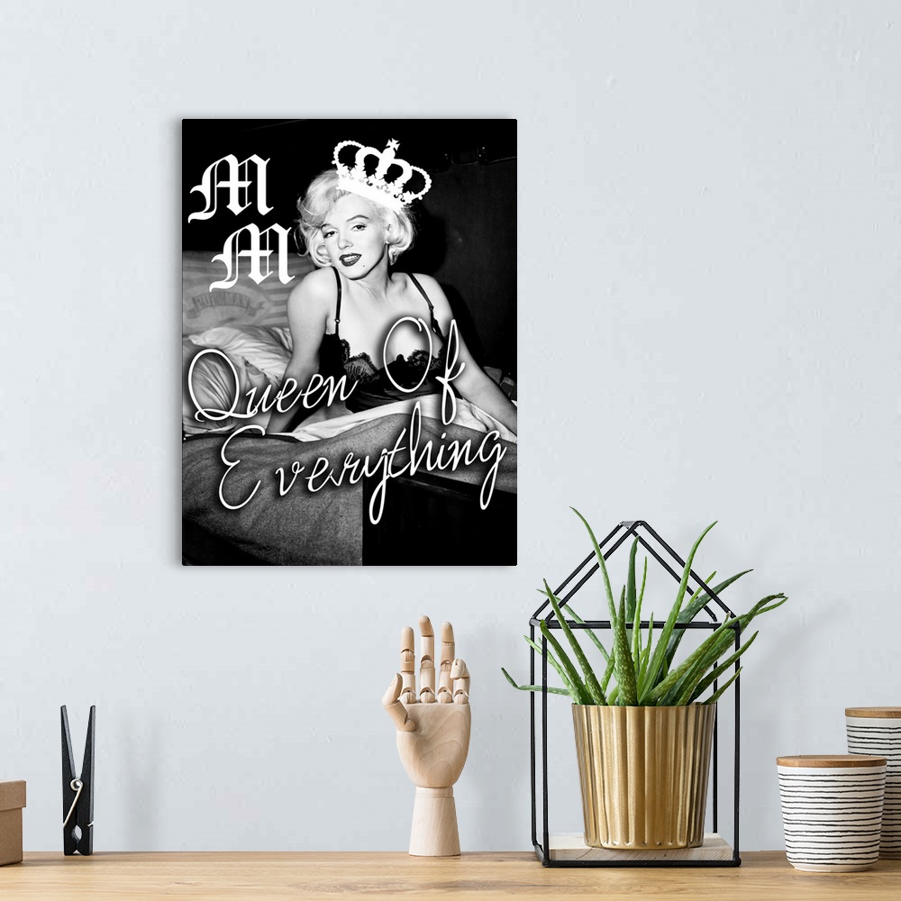A bohemian room featuring Black and white photograph of Marilyn Monroe with an illustrated crown placed on the side of her ...