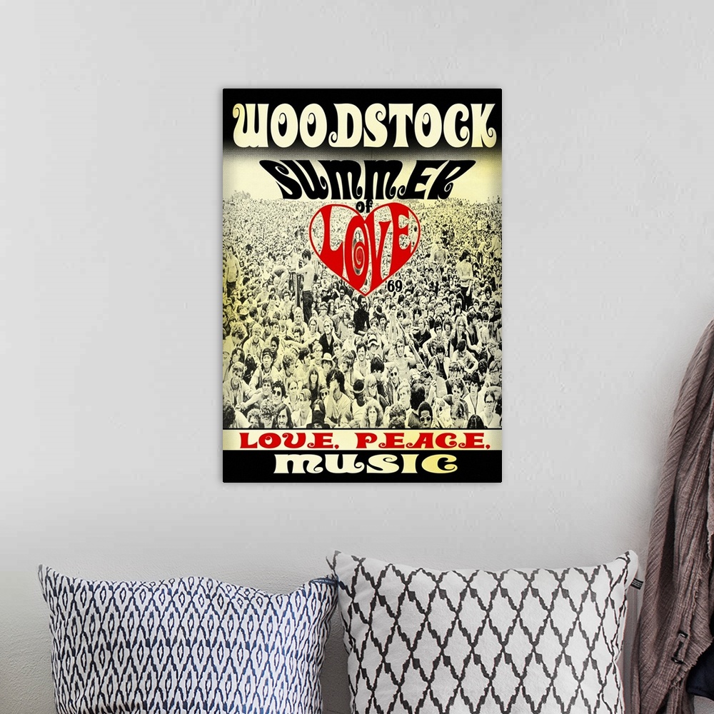 A bohemian room featuring Woodstock poster with a black and white image of the crowd and 'Summer of Love,' 'Love, Peace, Mu...