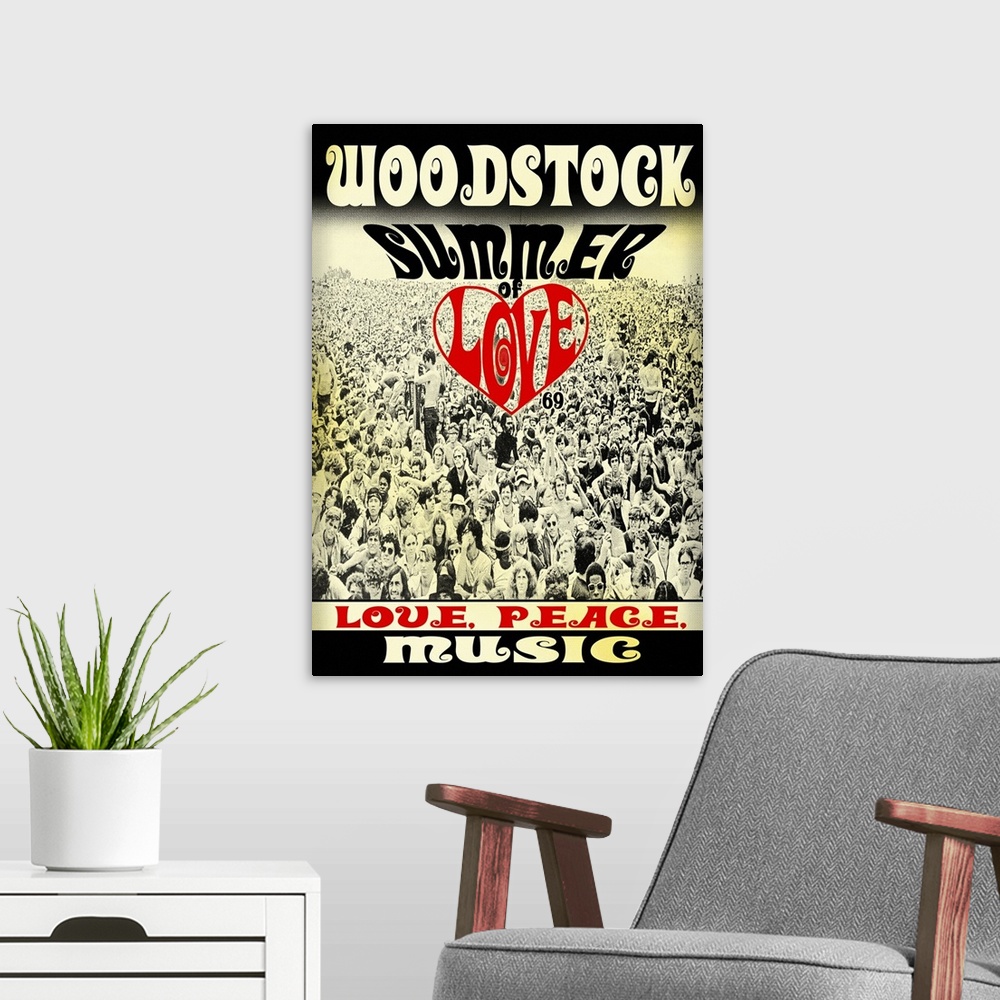 A modern room featuring Woodstock poster with a black and white image of the crowd and 'Summer of Love,' 'Love, Peace, Mu...