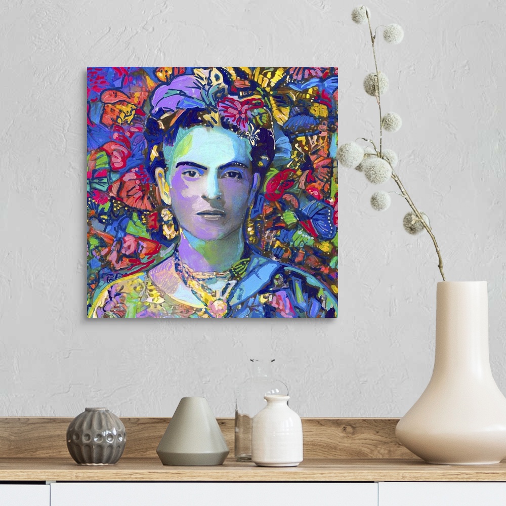 A farmhouse room featuring A moody painting portrait of Frida with colorful broken and fractured butterfly wings surround th...