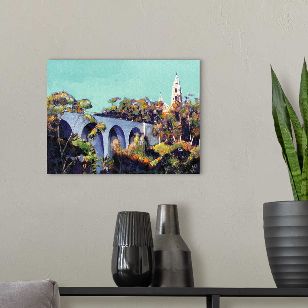 A modern room featuring Cabrillo Bridge Balboa Park San Diego painting by RD Riccoboni. The California Building is seen a...