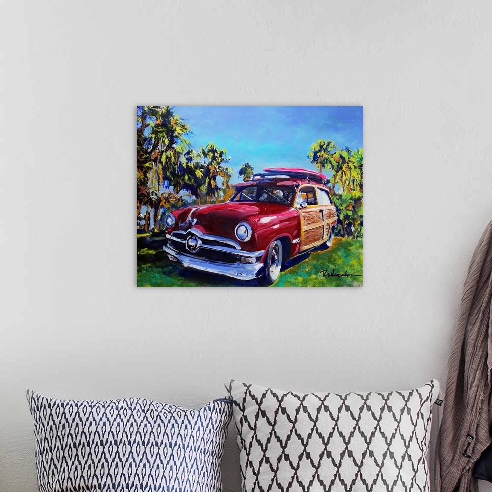 A bohemian room featuring The classic California Woodie car, painting by Rd Riccoboni.