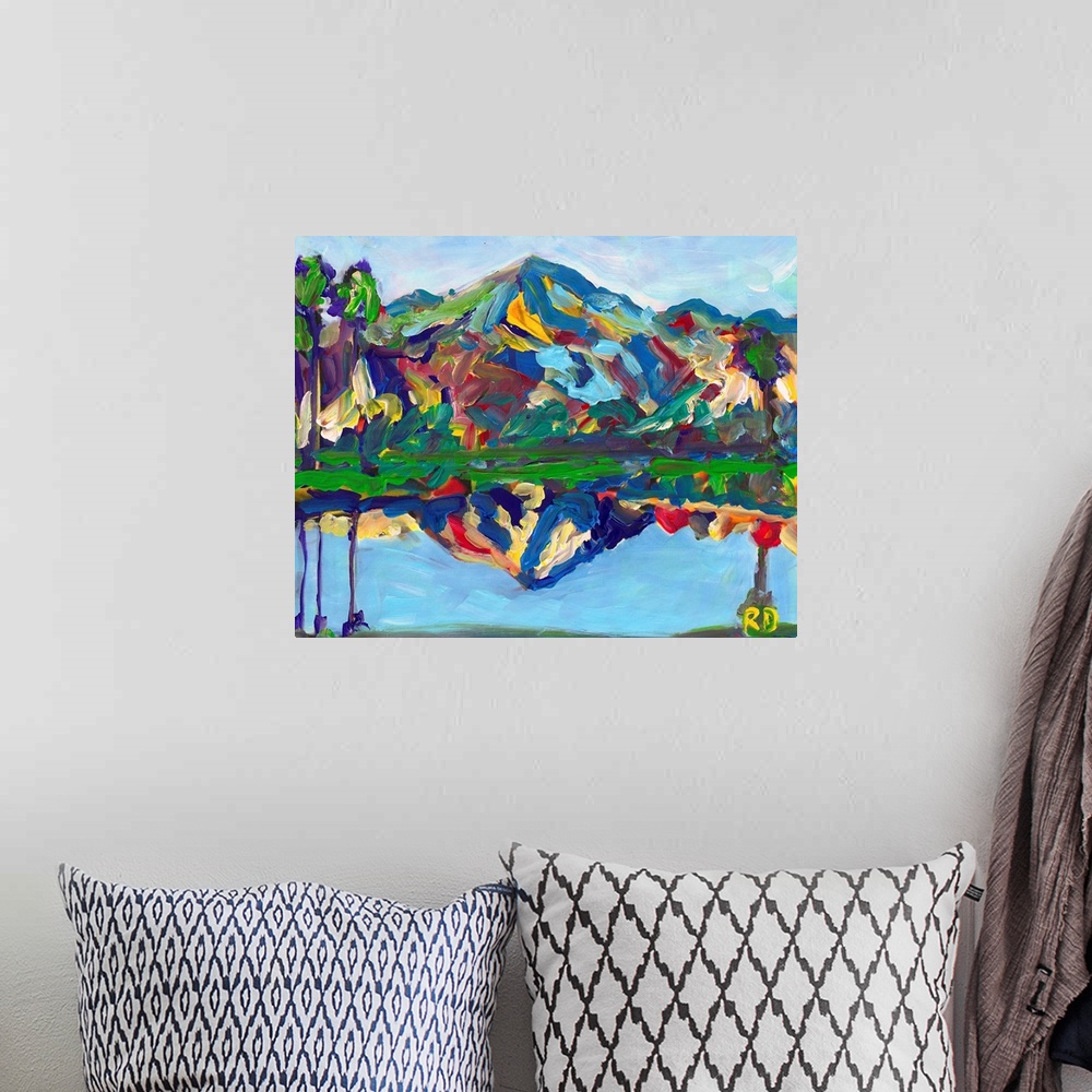 A bohemian room featuring Palm Springs San Jacinto Reflection, abstract desert landscape painting by RD Riccoboni. Blues, g...
