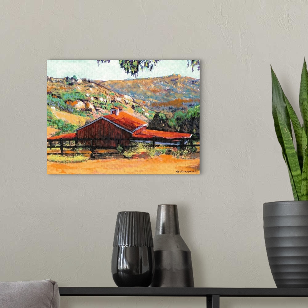 A modern room featuring Painting of a red barn at a ranch in San Diego with rolling hills in the background.