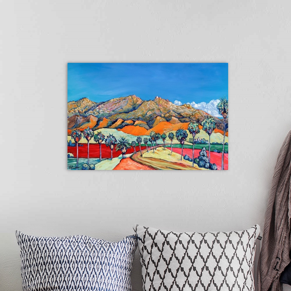 A bohemian room featuring San Diego desert in exciting bright and bold colors. Blue skies and swaths of color, rugged mount...