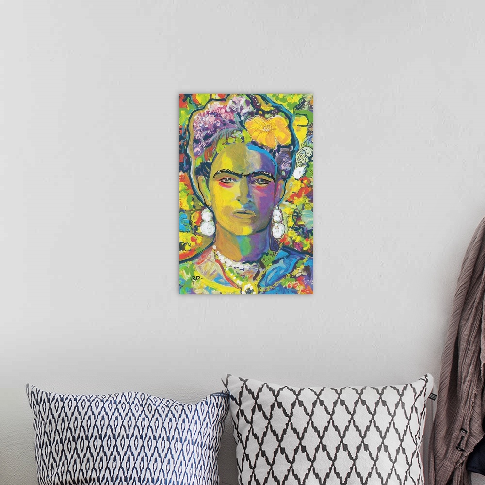 A bohemian room featuring Yellow Frida by RD Riccoboni, painted in gold and yellow tones with red blue green purple and orange