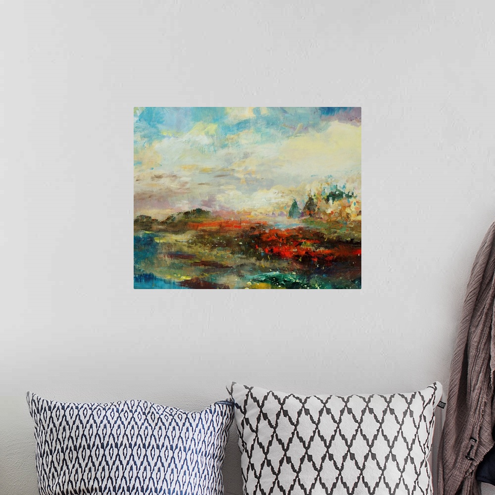 A bohemian room featuring Abstracted landscape painting with a cityscape on the horizon.