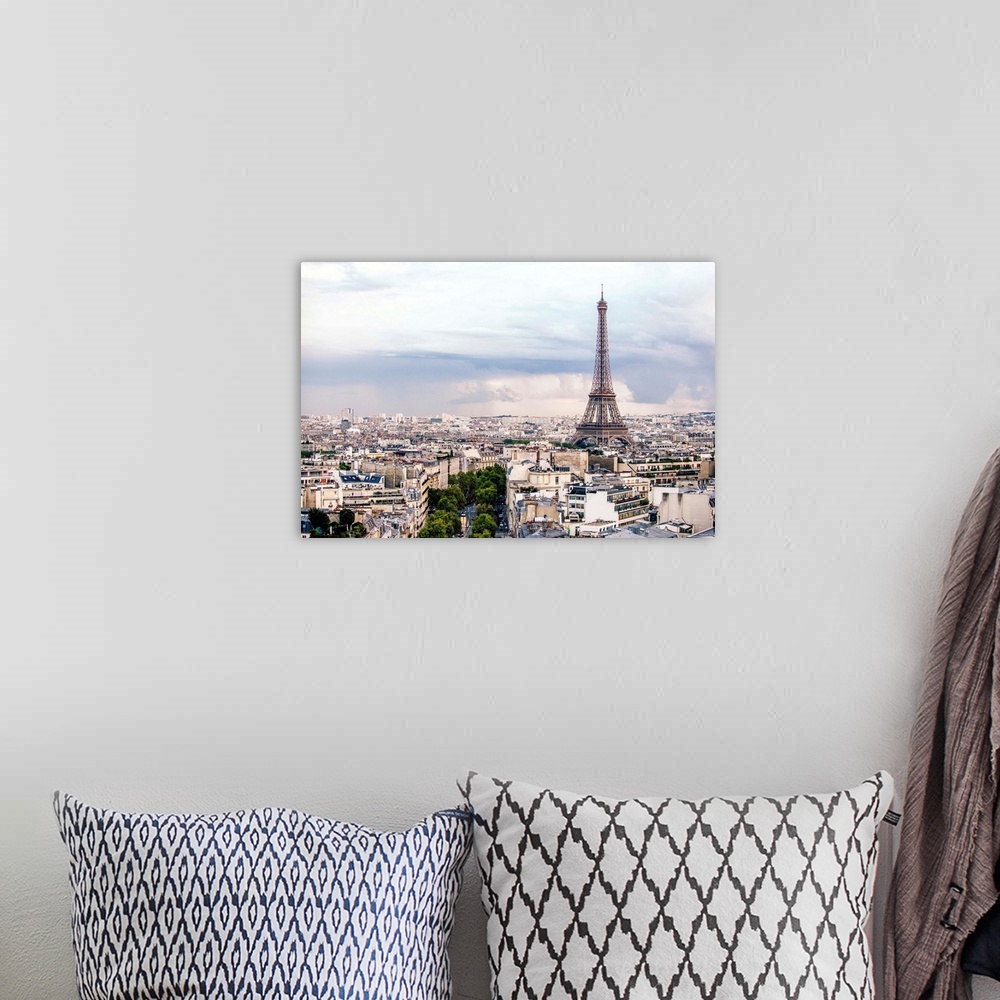 A bohemian room featuring Aerial photograph of a Paris cityscape with the Eiffel Tower towering over all the buildings.