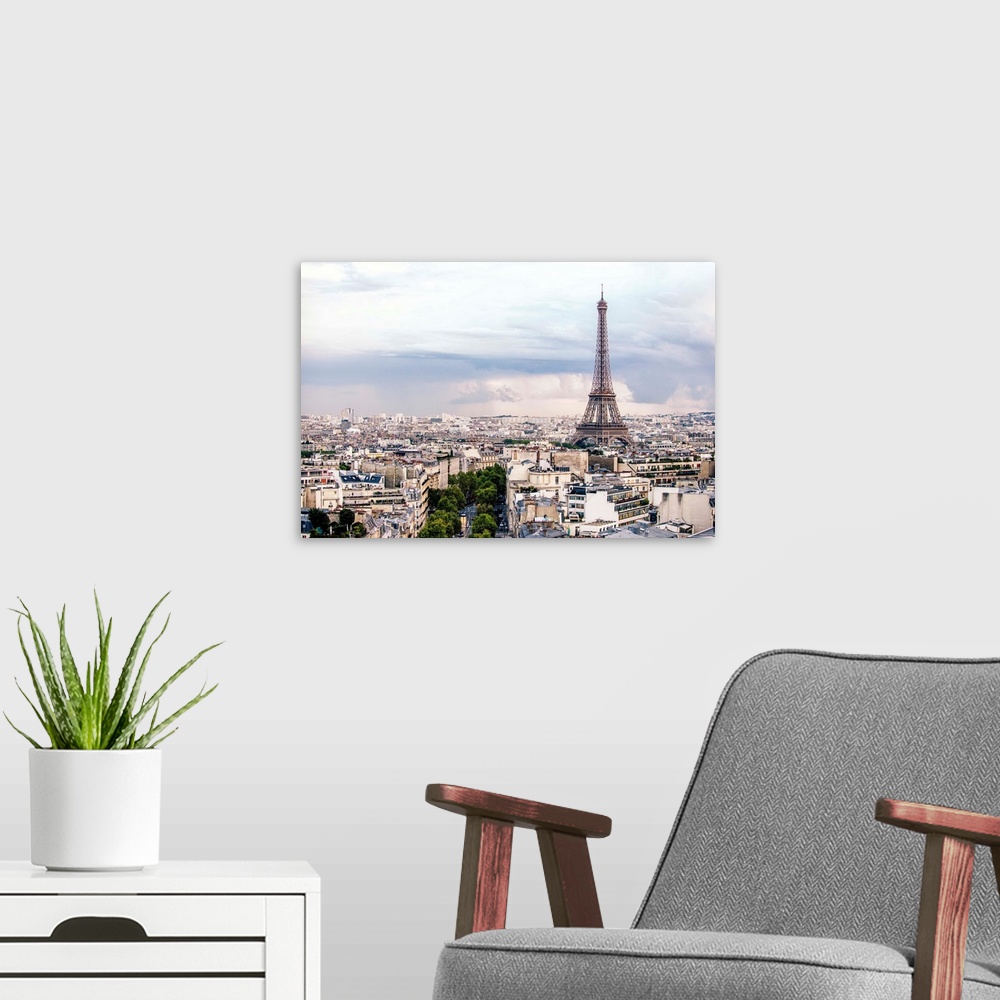 A modern room featuring Aerial photograph of a Paris cityscape with the Eiffel Tower towering over all the buildings.