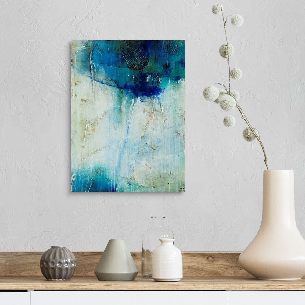 A farmhouse room featuring Abstract art of a large mass of cool colors at the top, with a single line of blue that leads dow...