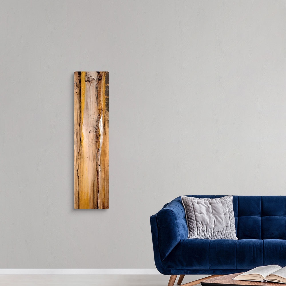 A modern room featuring Vertical long canvas painting with abstract lines and wood grain texture.