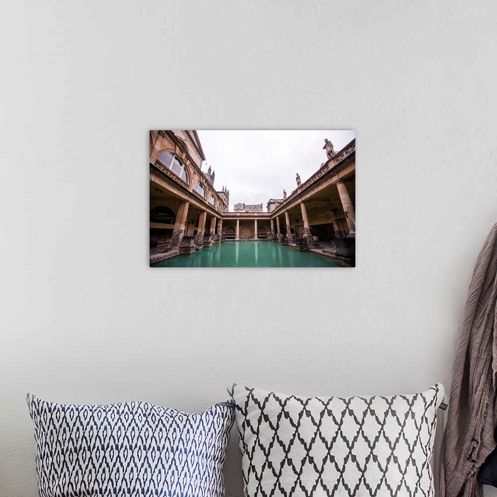 A bohemian room featuring Photograph of the Great Bath in England with gray, cloudy skies above, Bath, England, UK