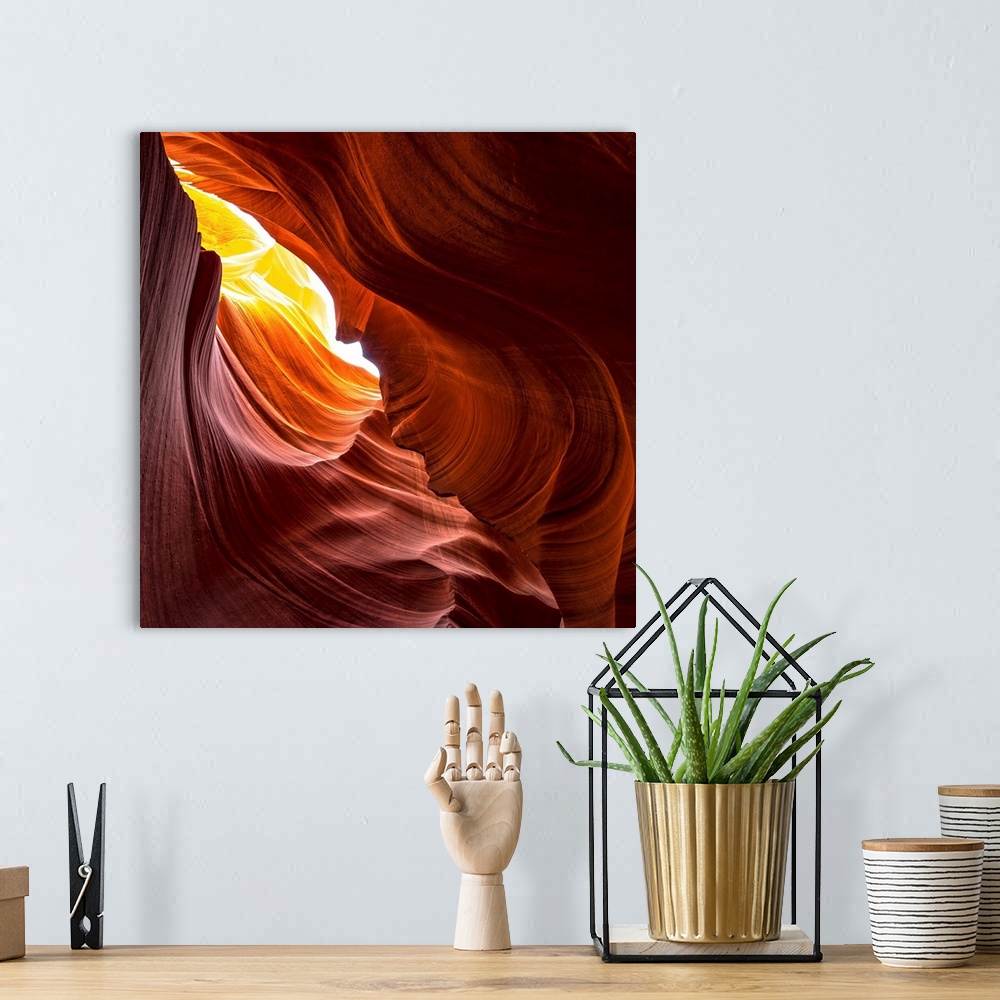A bohemian room featuring Square photograph from inside of Antelope Canyon rock formation located on the Navajo Reservation...