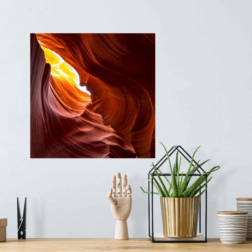 A bohemian room featuring Square photograph from inside of Antelope Canyon rock formation located on the Navajo Reservation...
