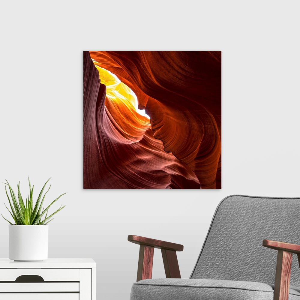 A modern room featuring Square photograph from inside of Antelope Canyon rock formation located on the Navajo Reservation...