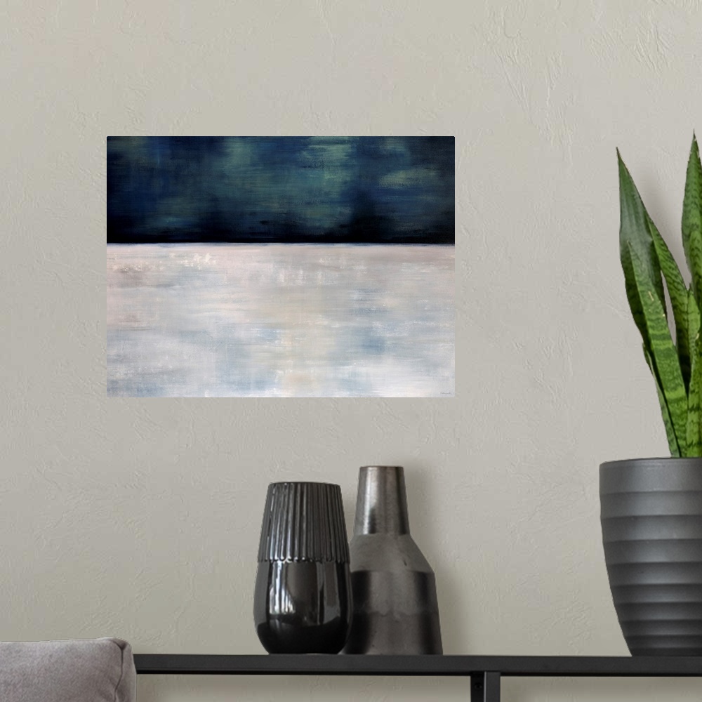 A modern room featuring This oversize wall art is an abstract landscape painting of snow and a starless sky.