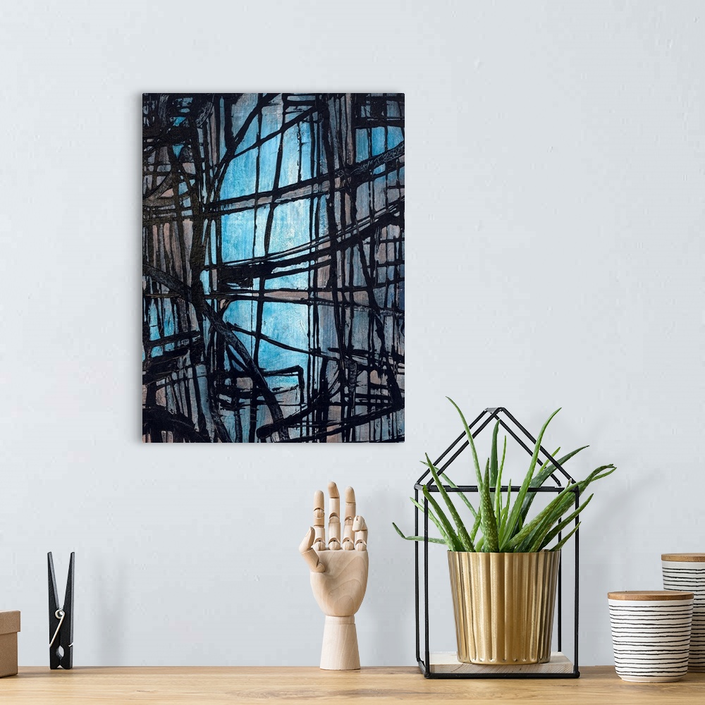 A bohemian room featuring Portrait, oversized, abstract art of rough, dark lines, intersecting in various directions on a l...