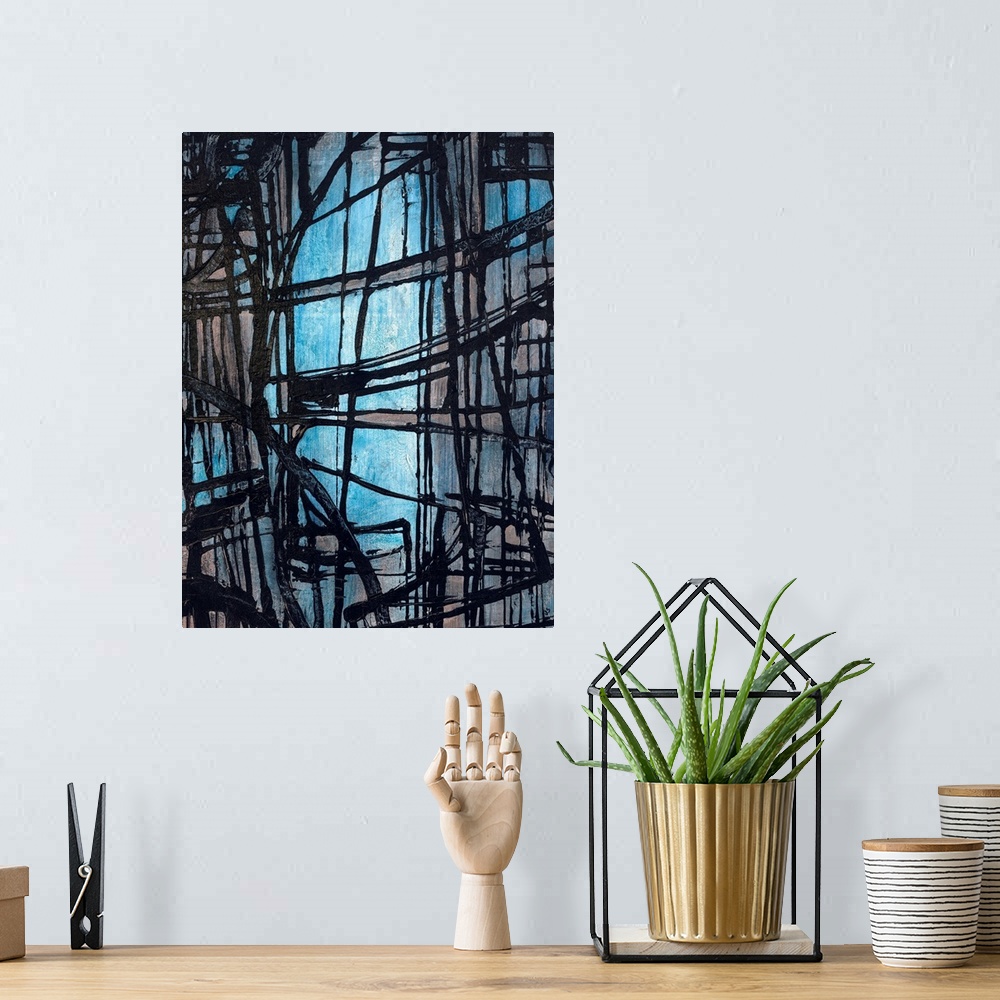 A bohemian room featuring Portrait, oversized, abstract art of rough, dark lines, intersecting in various directions on a l...