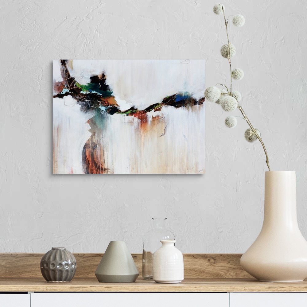 A farmhouse room featuring Earthly tones cut through the middle of ivory tones in this abstract painting.