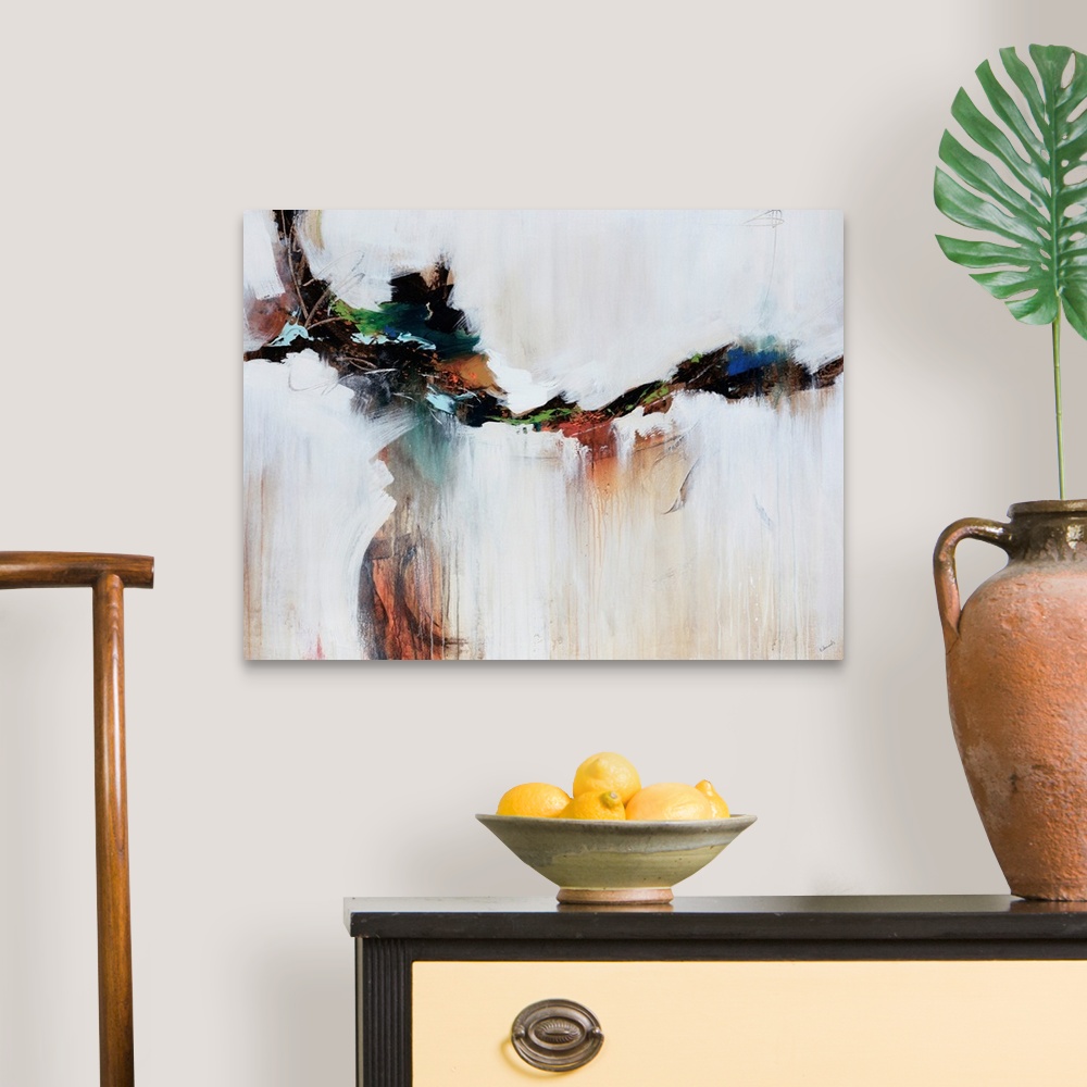 A traditional room featuring Earthly tones cut through the middle of ivory tones in this abstract painting.