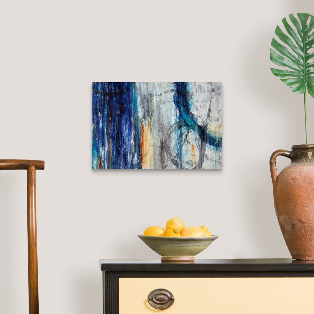 A traditional room featuring Abstract artwork painted with muted grays and darker blue tones.