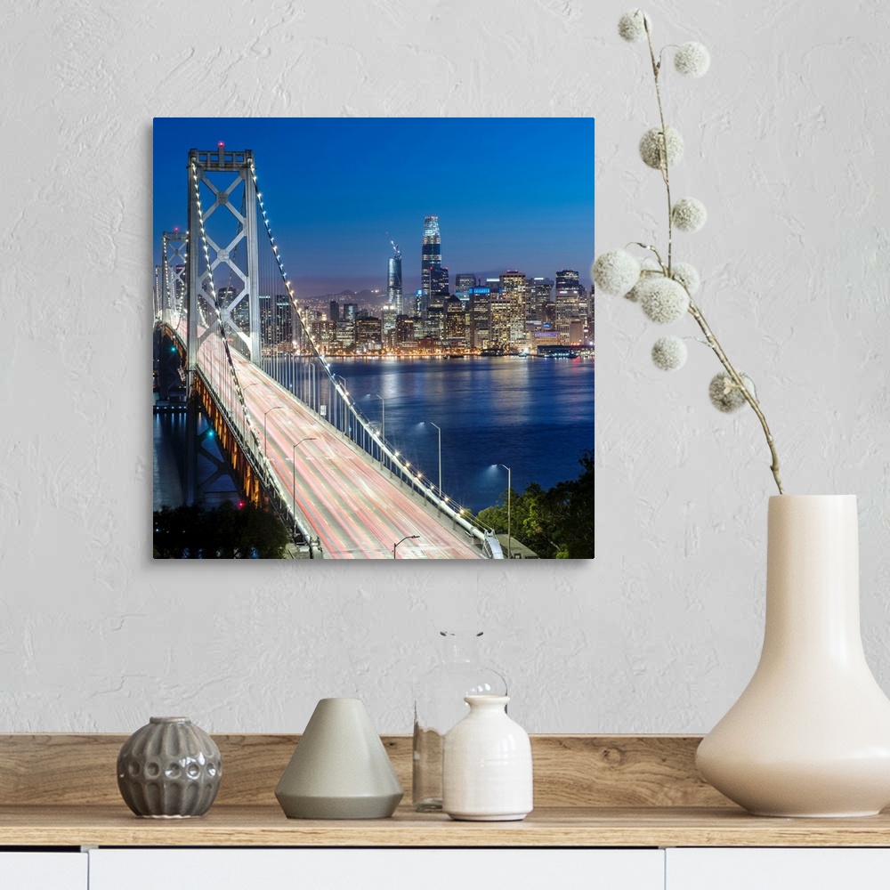 A farmhouse room featuring Square photograph of the Bay Bridge at dusk with downtown San Francisco lit up in the background.