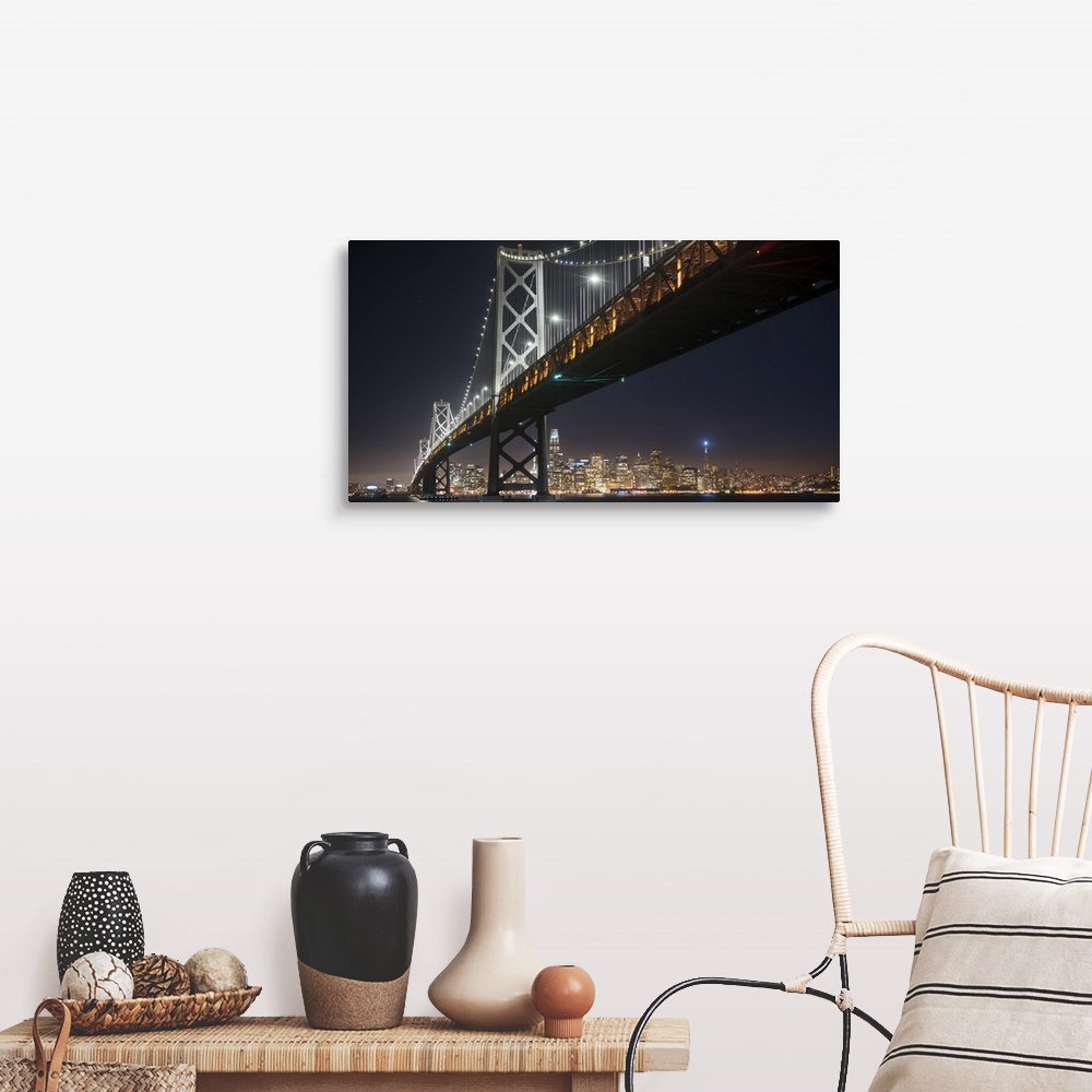 A farmhouse room featuring Photograph of the Bay Bridge at night from below with the San Francisco skyline lit up in the bac...