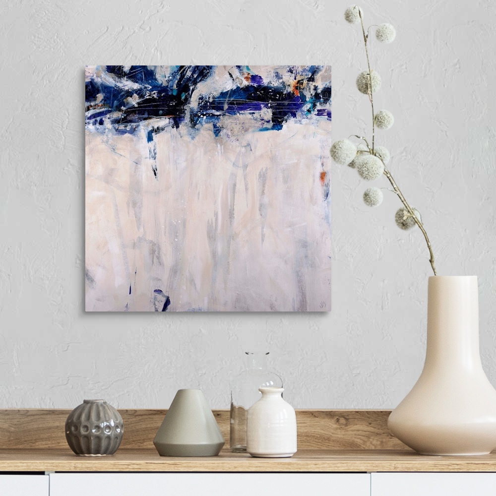 A farmhouse room featuring This artwork is a square gicloe print of an abstract painting with dark shapes decorating the top...
