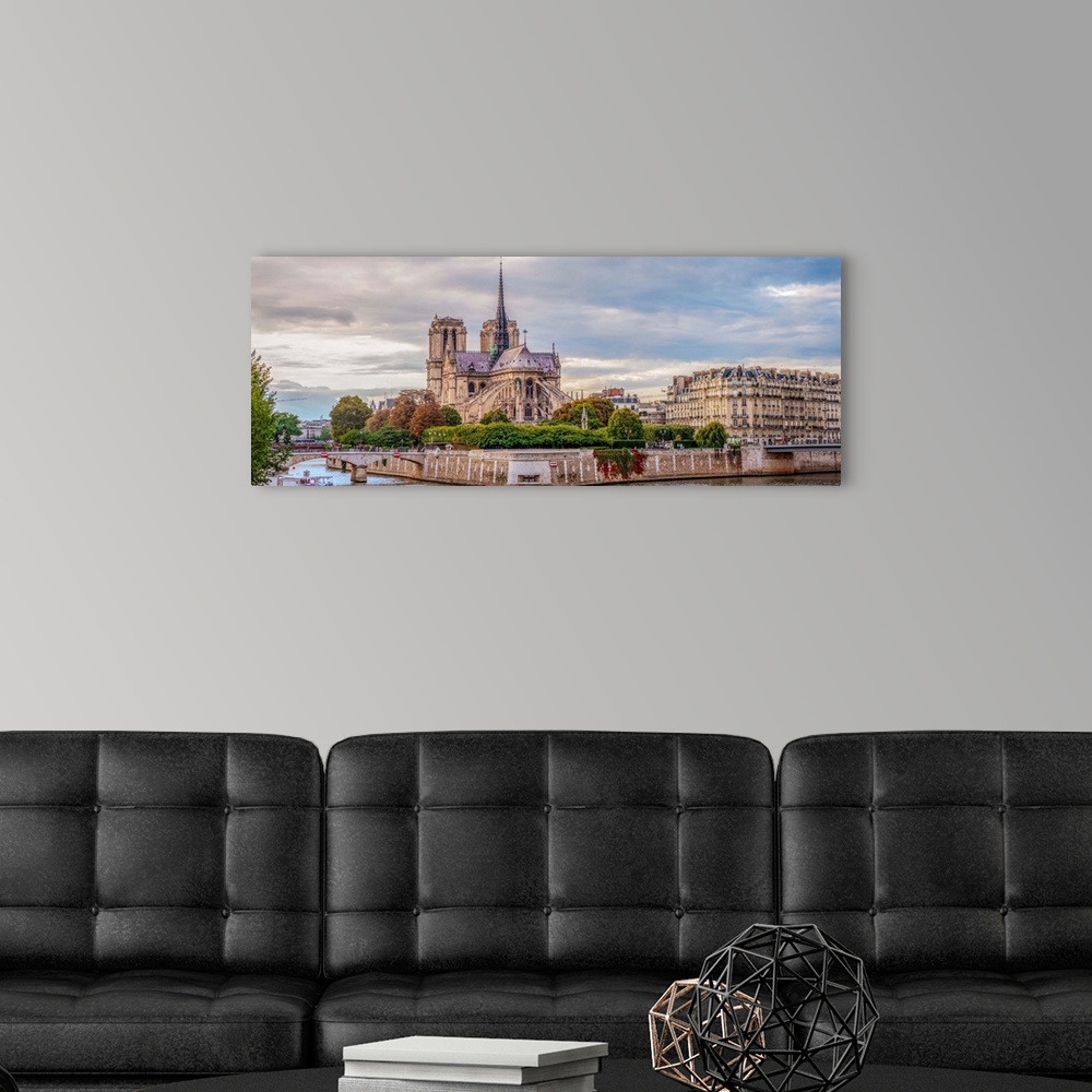 A modern room featuring Panoramic photograph of the backside of Notre Dame.