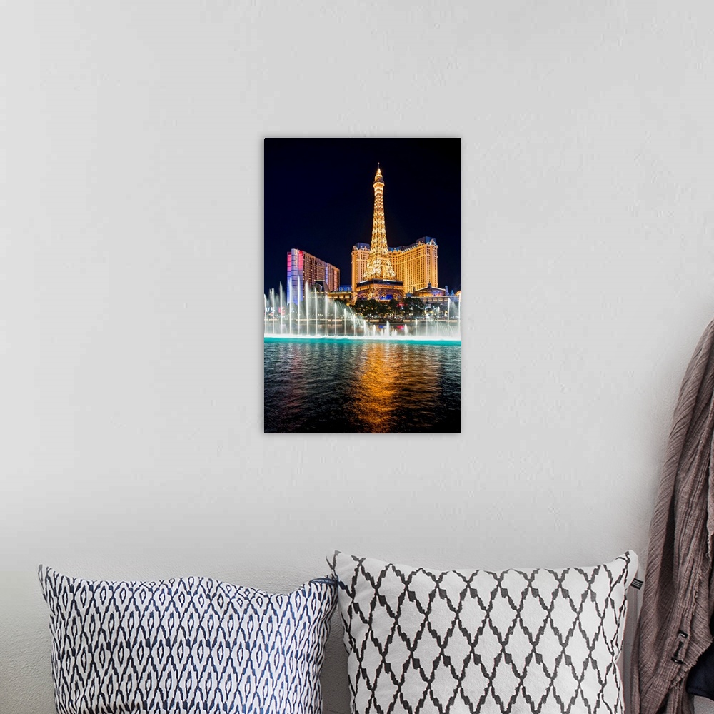 A bohemian room featuring Photograph of the Bellagio Water Show outside of the Bellagio, Ballys, and the Eiffel Tower at ni...