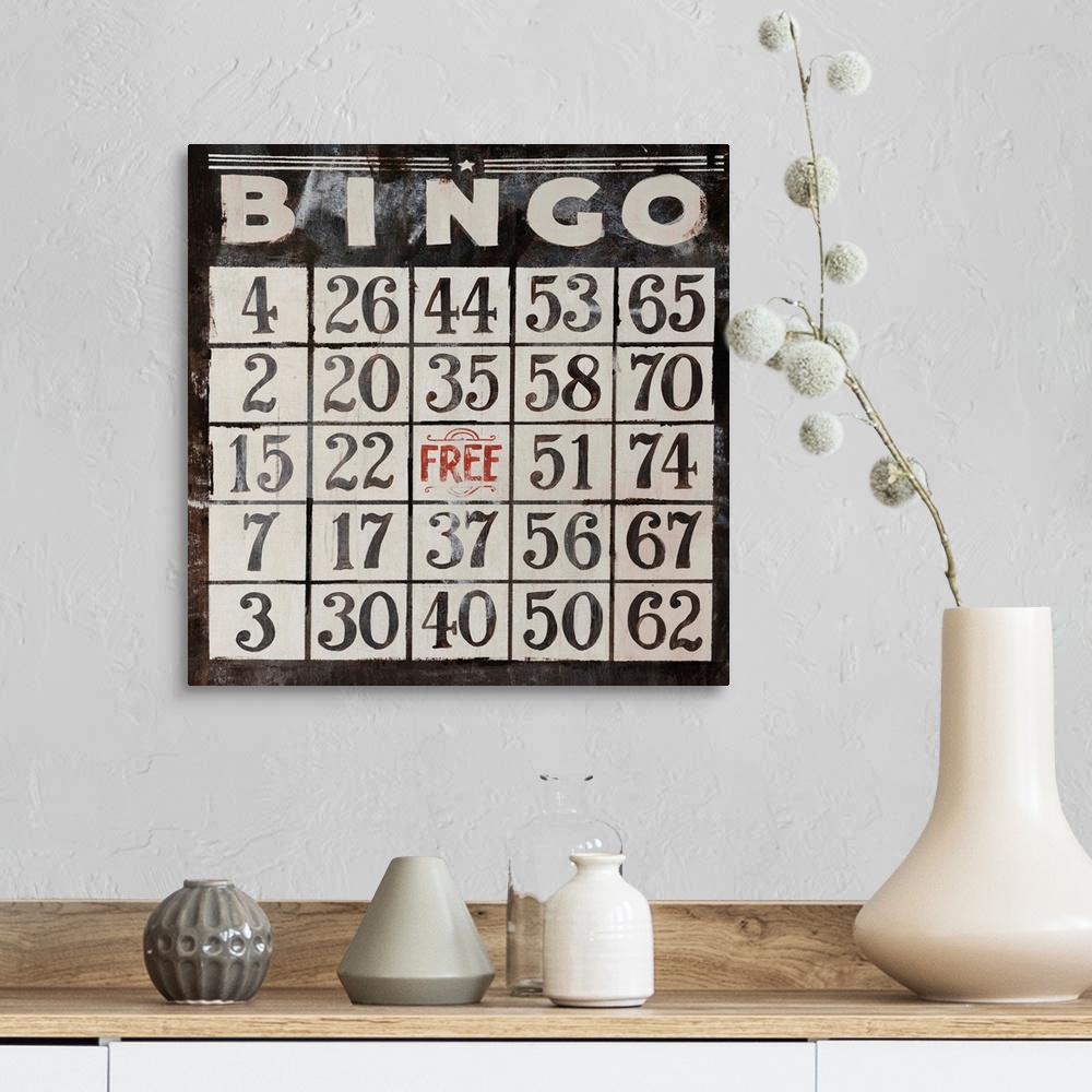 A farmhouse room featuring This large piece has an antique style Bingo card that takes up the entire face of artwork.