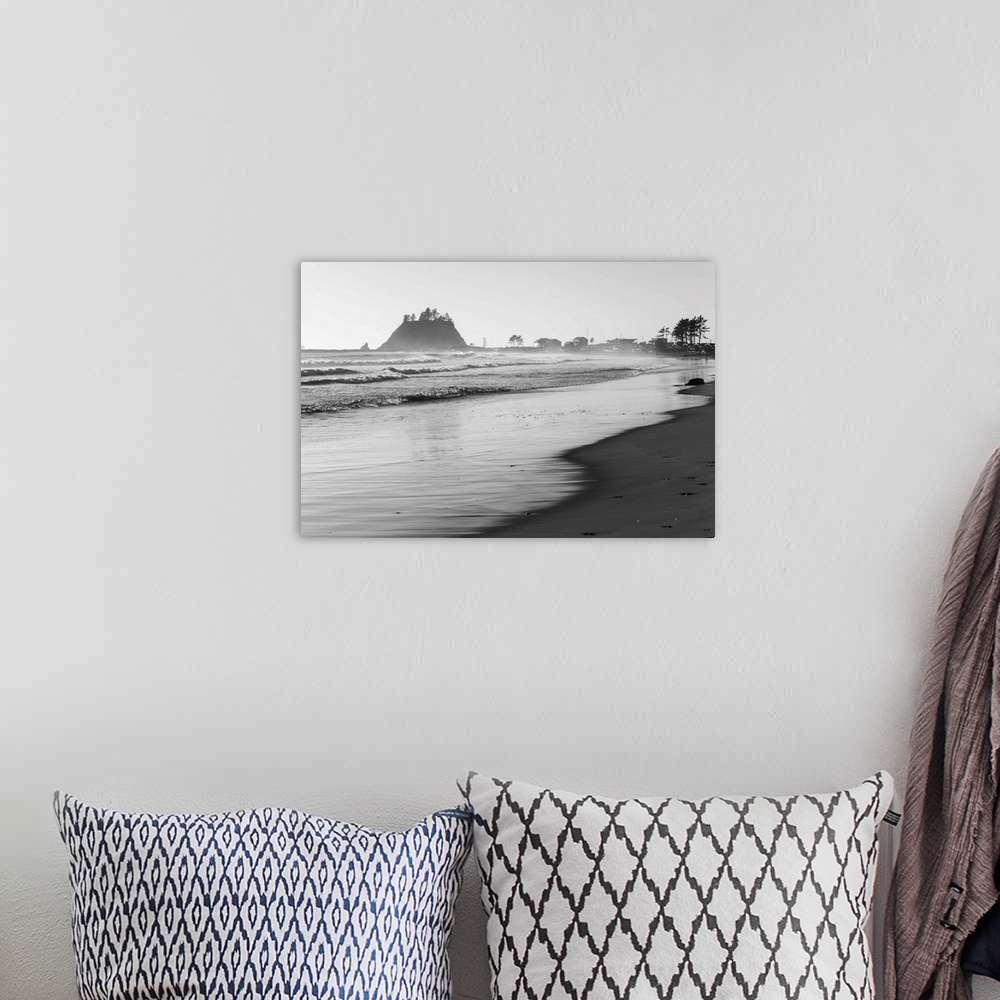 A bohemian room featuring Black and white landscape photograph of the La Push Beach shore with misty rock cliffs in the bac...