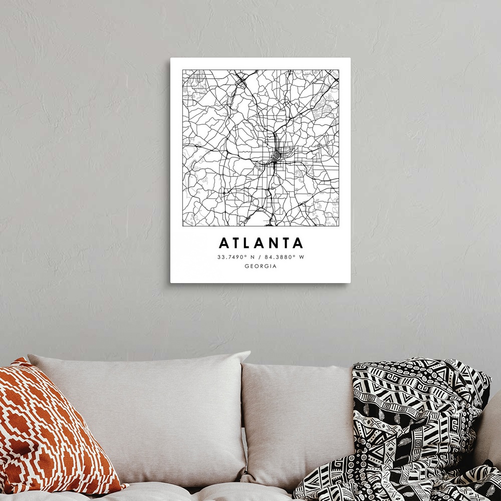 A bohemian room featuring Black and white minimal city map of Atlanta, Georgia, USA with longitude and latitude coordinates.