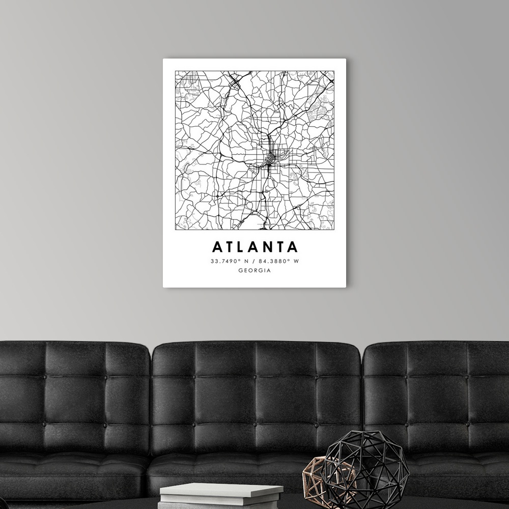 A modern room featuring Black and white minimal city map of Atlanta, Georgia, USA with longitude and latitude coordinates.