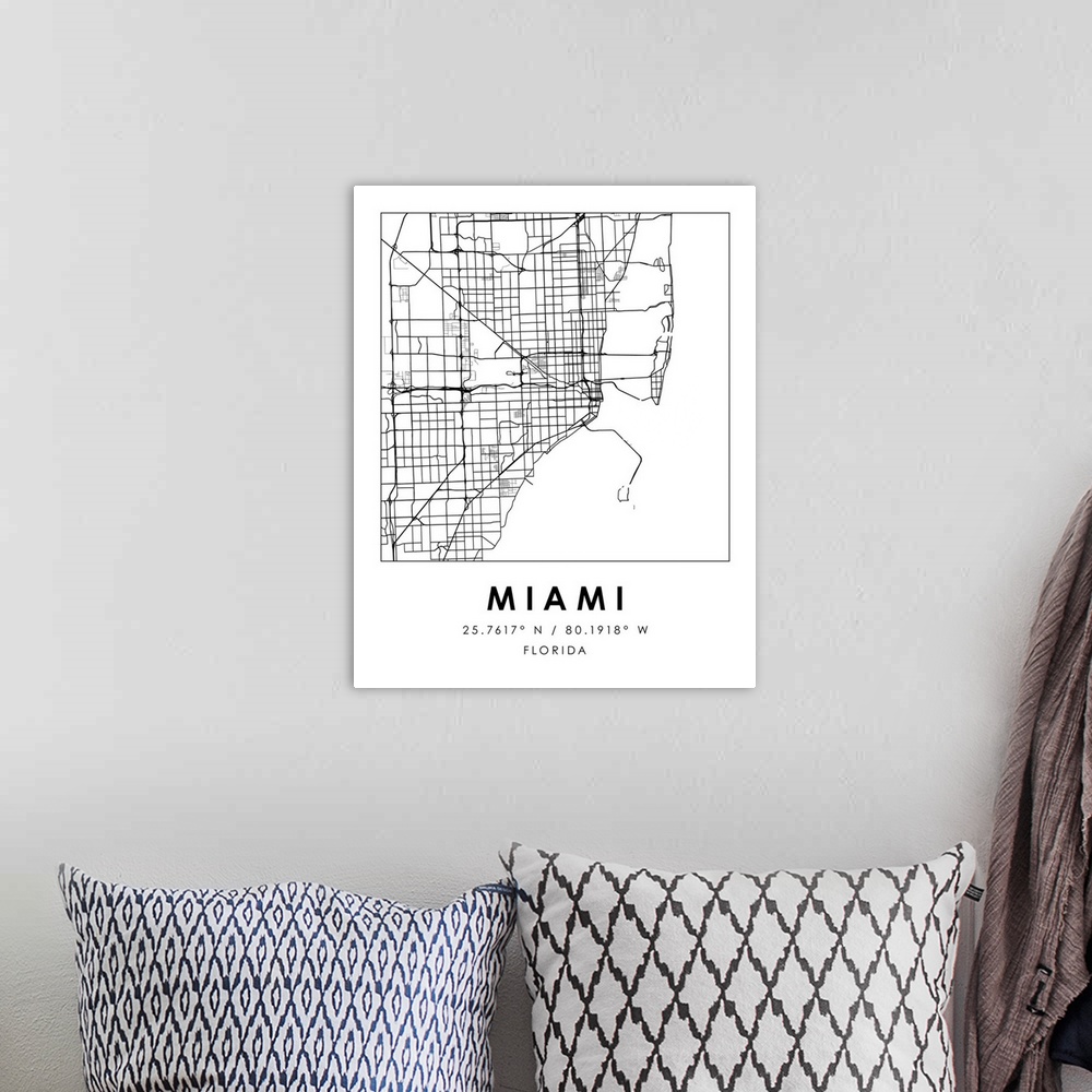 A bohemian room featuring Black and white minimal city map of Miami, Florida USA with longitude and latitude coordinates.
