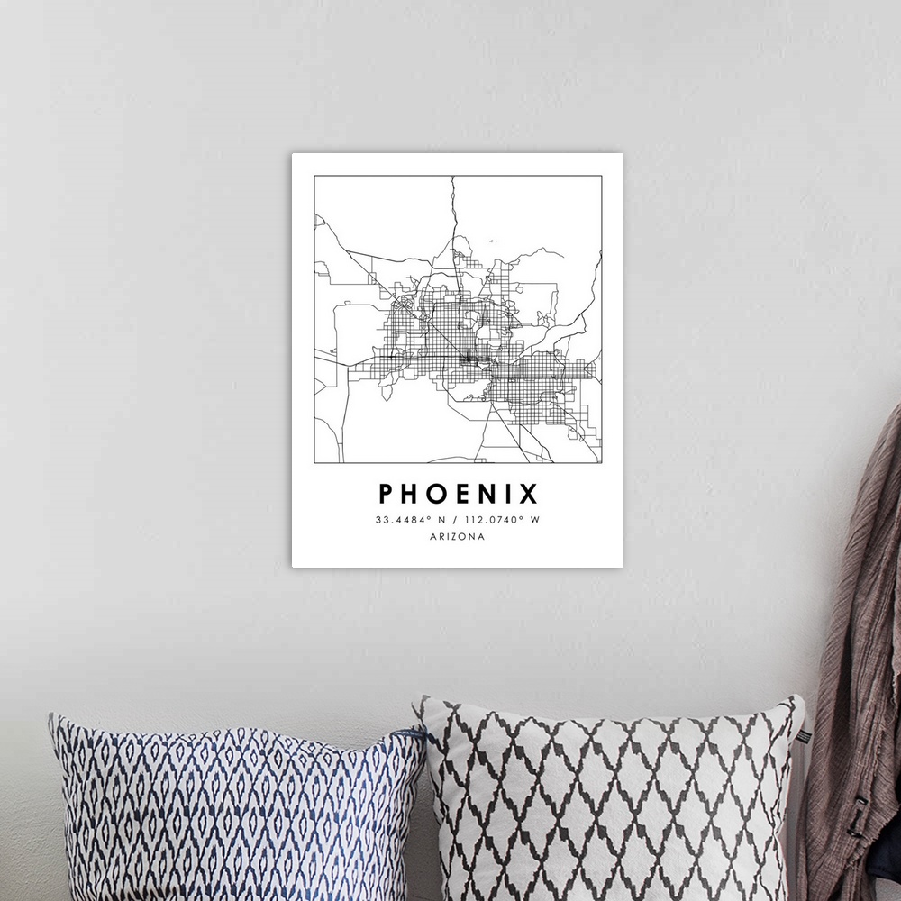 A bohemian room featuring Black and white minimal city map of Phoenix, Arizona, USA with longitude and latitude coordinates.