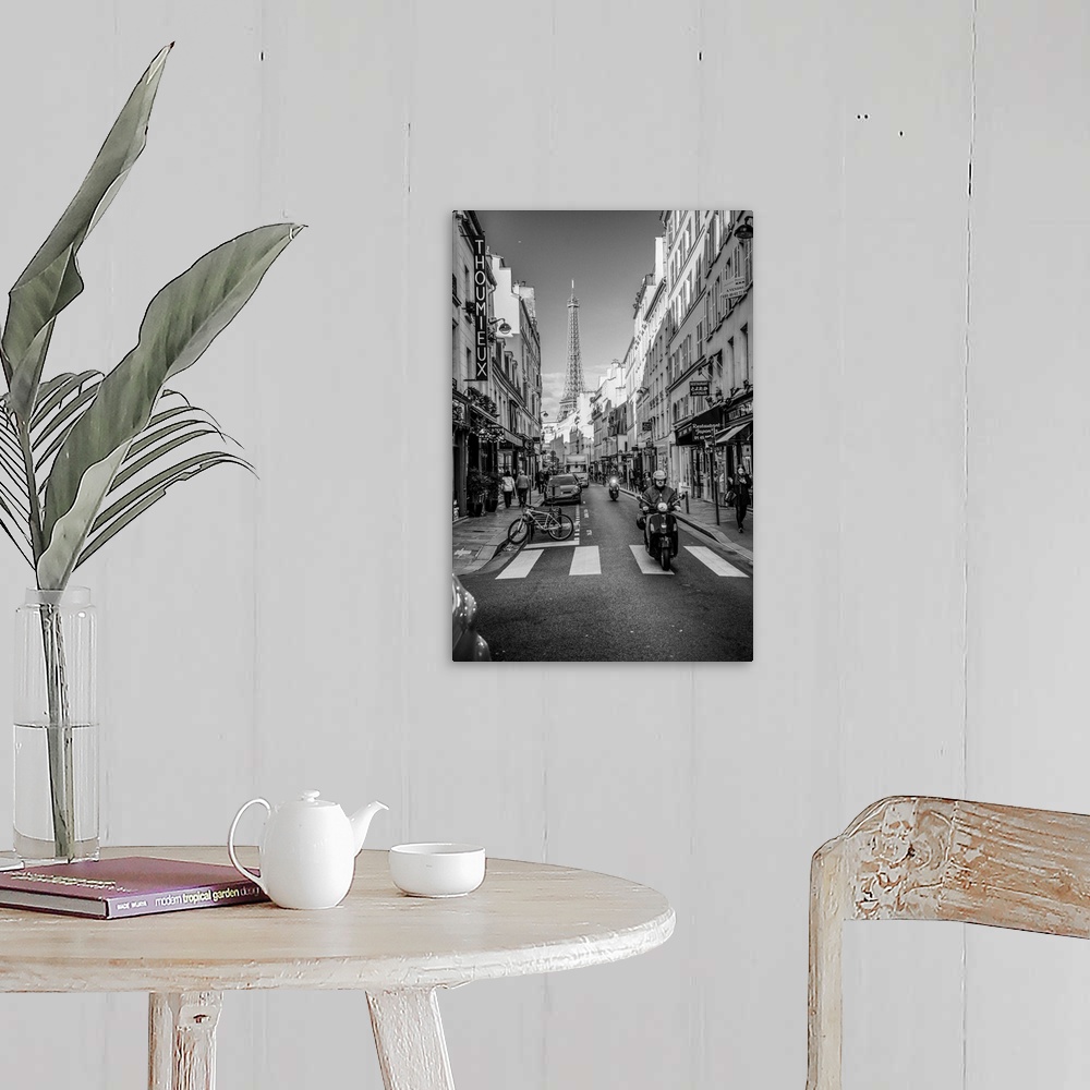 A farmhouse room featuring Black and white photograph of a street view in Paris with the Eiffel Tower in the background and ...