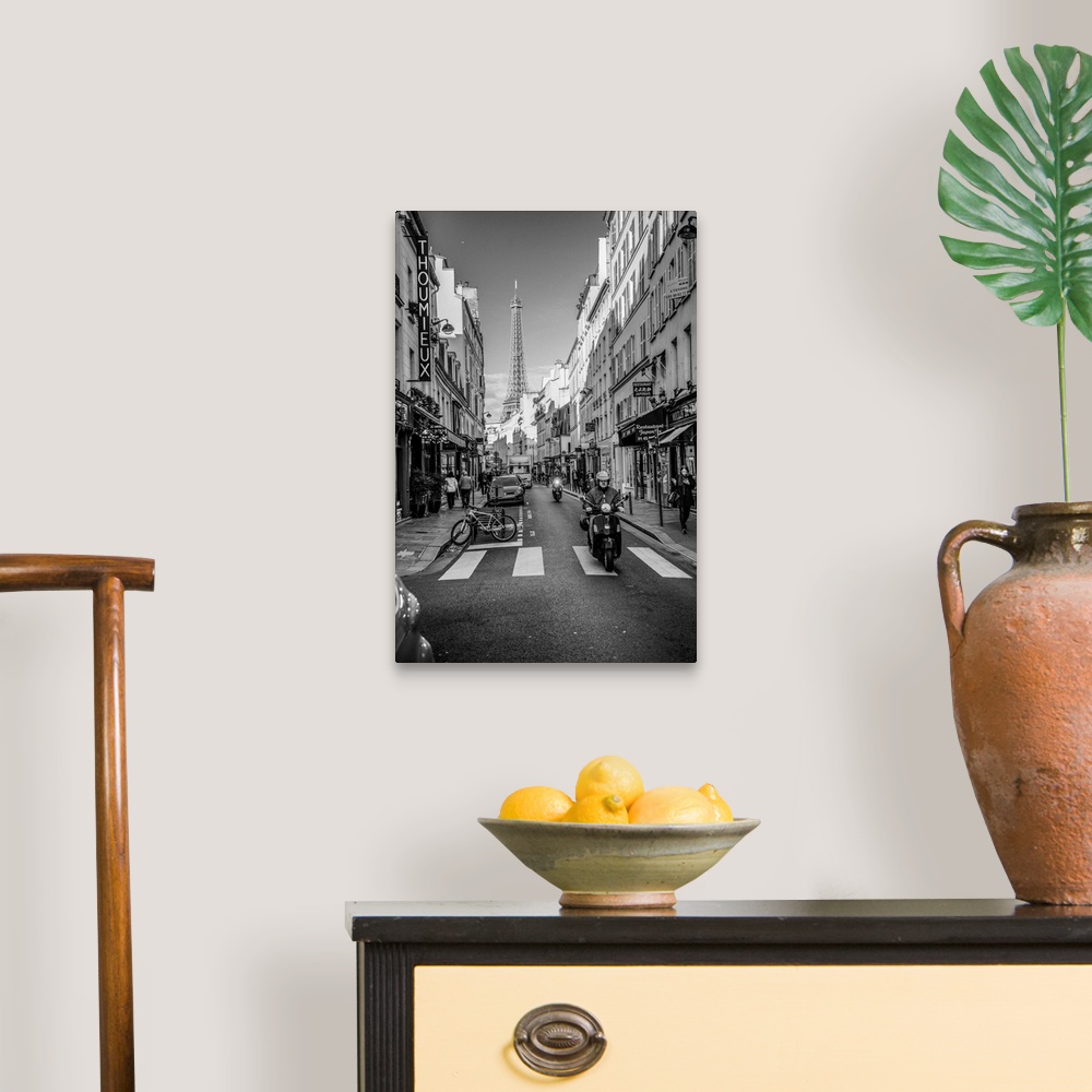 A traditional room featuring Black and white photograph of a street view in Paris with the Eiffel Tower in the background and ...