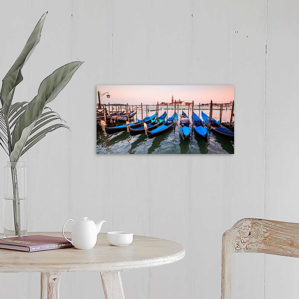 A farmhouse room featuring Panoramic photograph of blue gondolas docked in a row on the water with St. Mark's Square in the ...