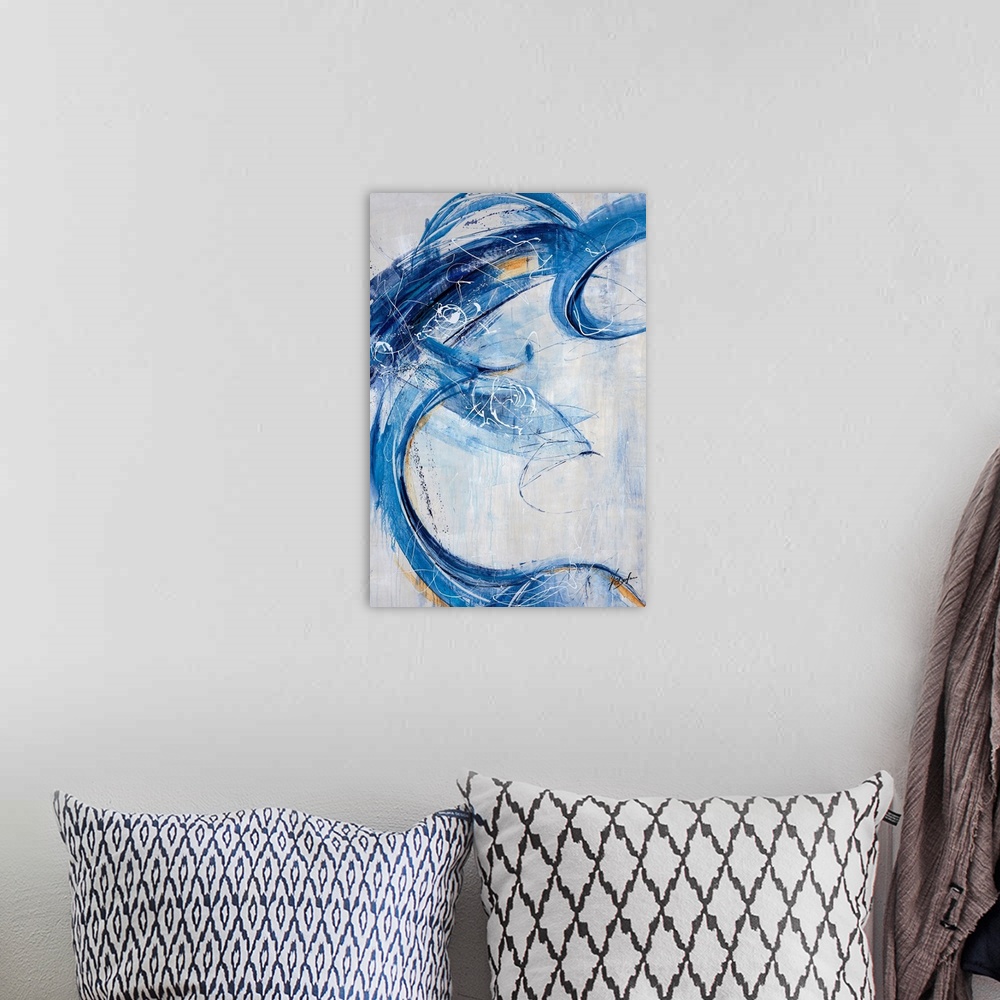 A bohemian room featuring Contemporary painting of energetic blue brushstrokes that sweep over this vertical composition an...