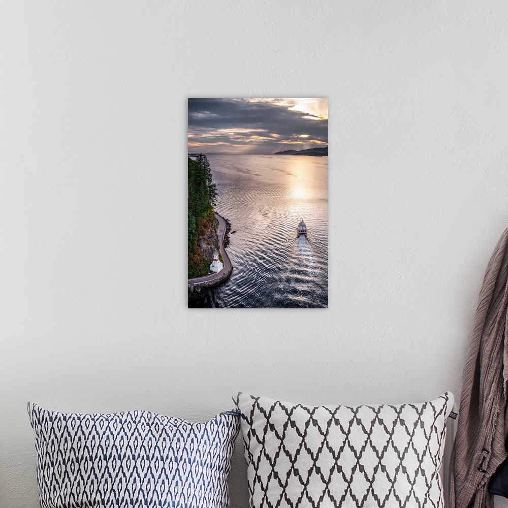 A bohemian room featuring Aerial view of boat in Burrard Inlet with Stanley Park Seawall Path in Vancouver, British Columbi...