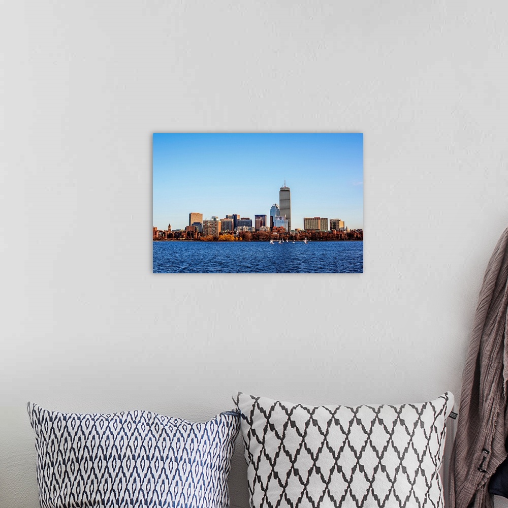 A bohemian room featuring View of Boston city skyline and Prudential Tower with sailboats on the Charles River.
