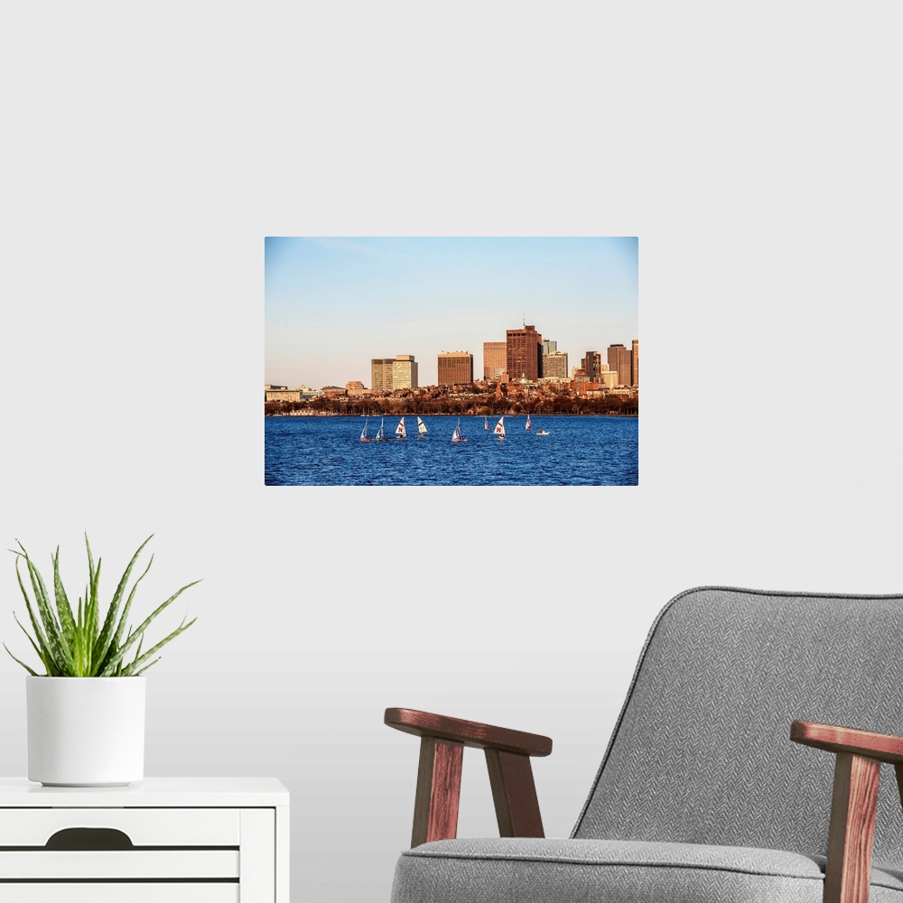 A modern room featuring View of Boston city skyline with sailboats on the Charles River.